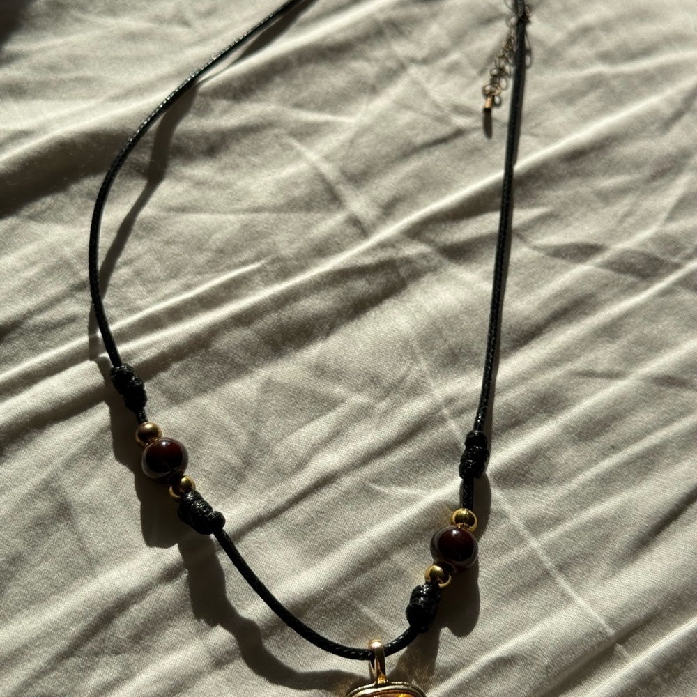 Elegant Black and Gold Beaded Necklace
